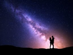 Milky Way with silhouette of people. Landscape with night sky